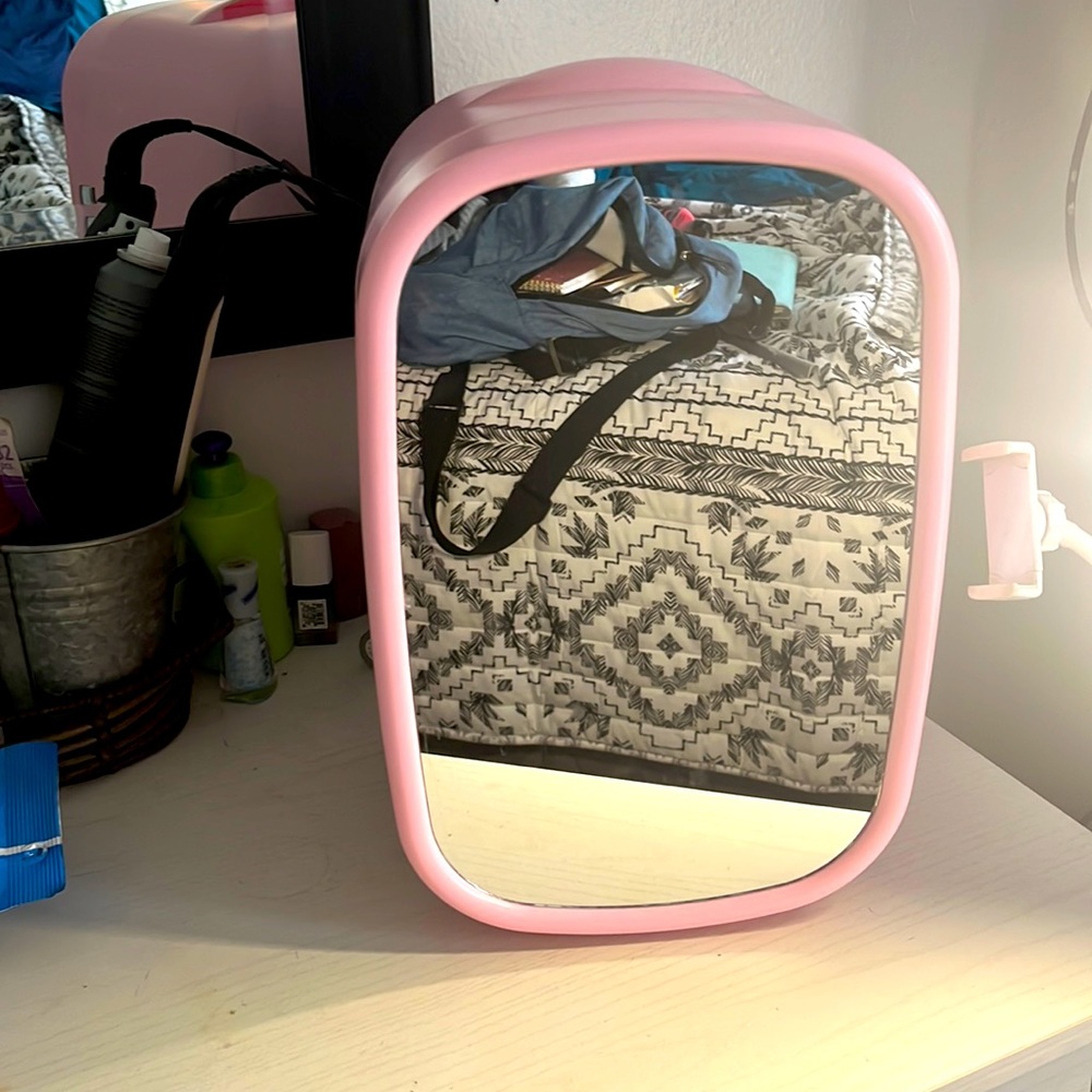 Pink mini fridge for beauty and food